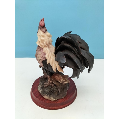 634 - Resin 23cm Figure of a Cockerel on a Plinth.