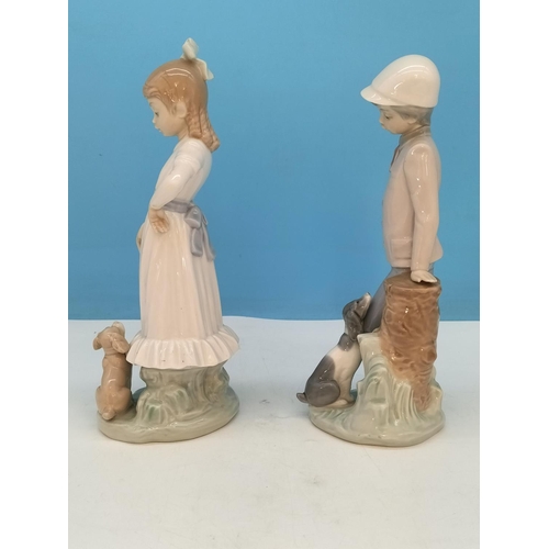 119 - Nao Figures (2), Young Girl and Young Boy with Dogs. Tallest 25cm