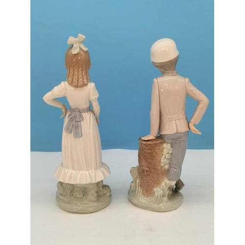 119 - Nao Figures (2), Young Girl and Young Boy with Dogs. Tallest 25cm