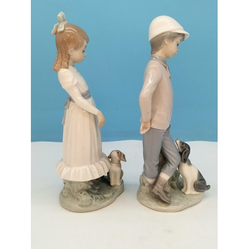 119 - Nao Figures (2), Young Girl and Young Boy with Dogs. Tallest 25cm