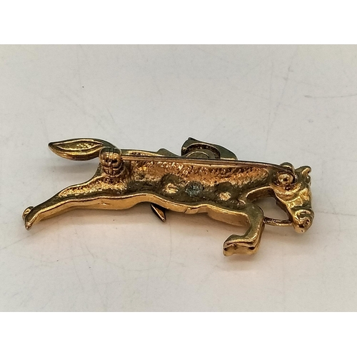 138 - Gold Tone Metal Horse and Rider Brooch. 5cm Long