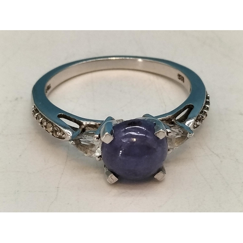 146 - 925 Silver Ring with Lavender Stone Flanked by Tiny Diamonds. Size R