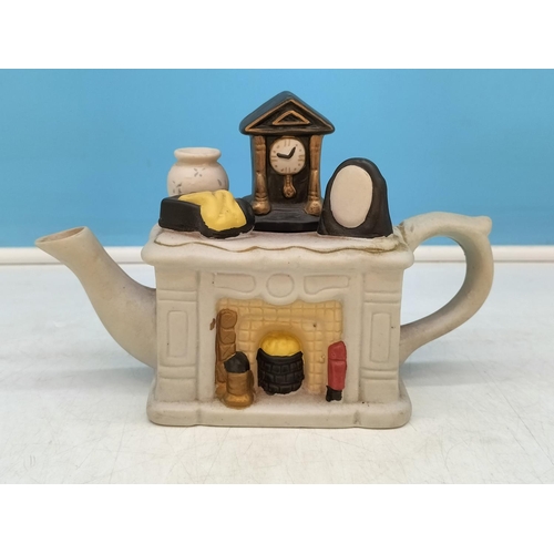 234 - Collection of Novelty Teapots