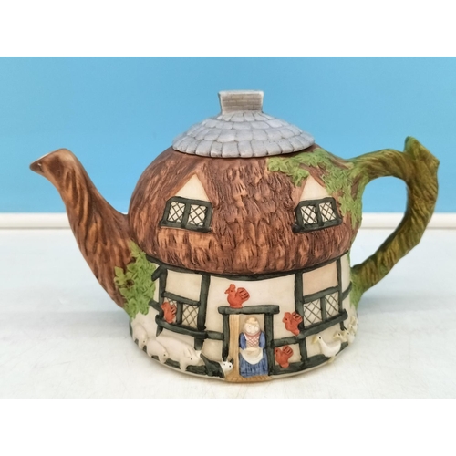 234 - Collection of Novelty Teapots