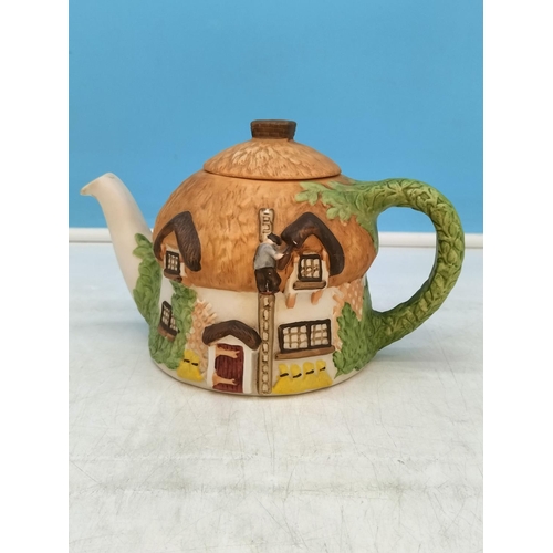 234 - Collection of Novelty Teapots