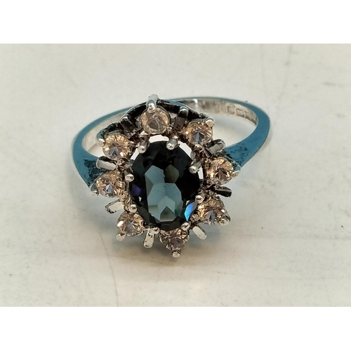 334 - 925 Silver, Blue and Clear Stones Ring. Size K