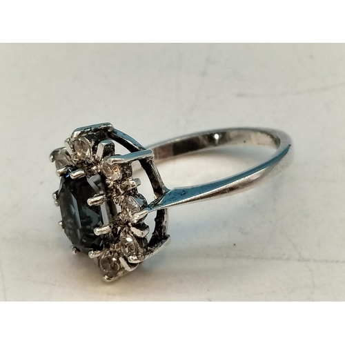 334 - 925 Silver, Blue and Clear Stones Ring. Size K