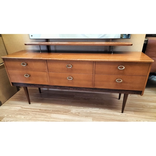 335 - Mid Century Six Drawer Dresser Unit/Dressing Table with Shelf and Mirror. 127cm High, 148cm x 39cm. ... 