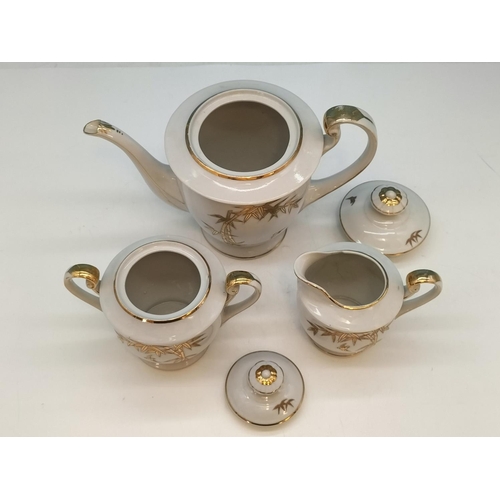 340 - Japanese White and Gold Geisha Girl 16 Piece Tea Set. Chip to Rim of 2 Plates.