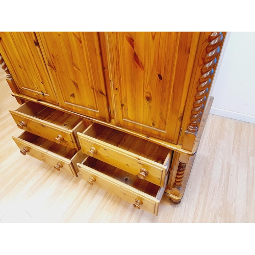 487 - Pine Three Door Over Four Drawer Wardrobe  with Barley Twist Columns. 190cm High, 143cm x 60cm. Coll... 