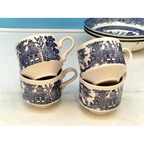 510 - Churchill Pottery Blue and White Part Dinner Service in the 'Willow' Pattern to include Dinner Plate... 