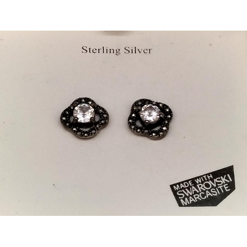 575 - Sterling Silver Swarovski and Marcasite Earrings plus Eternity Bracelet with Swarovski Crystals.