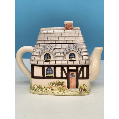 597 - Village Shop Teapots (4) plus Village Shop Storage Jar. Tallest 22cm. Light Chip to 2 Spouts and Bas... 