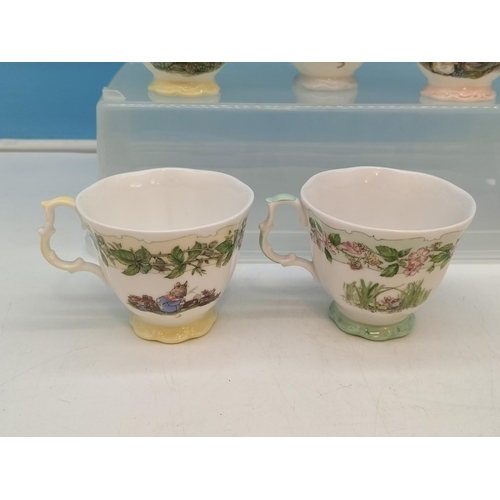 84 - Royal Doulton Brambly Hedge Cups (10) and a Saucer. Mostly Seconds