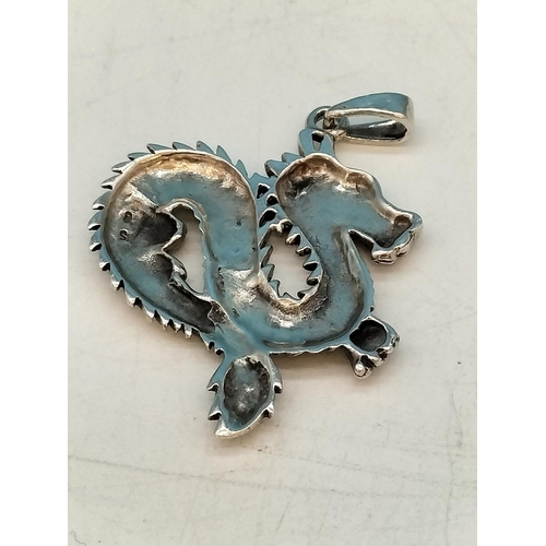 97 - Unmarked 925 Silver Dragon Pendant. 4cm x 4cm