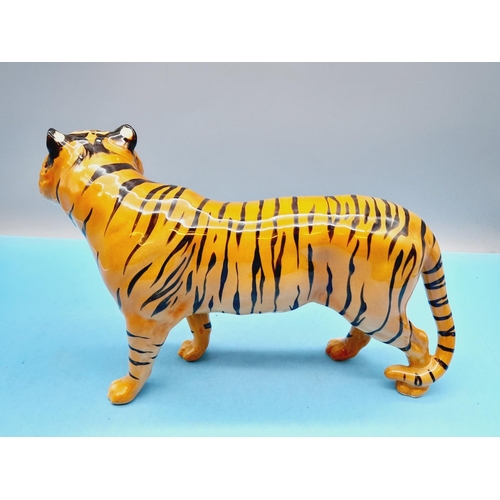 115 - Beswick Figure of a Tiger 19cm High x 29cm.