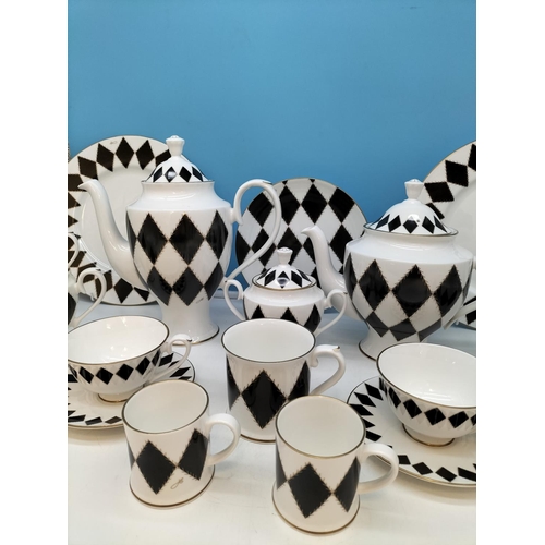 249 - Hudson Middleton Fine Bone China Tea and Coffee Pieces (19) in a Harlequin Pattern.