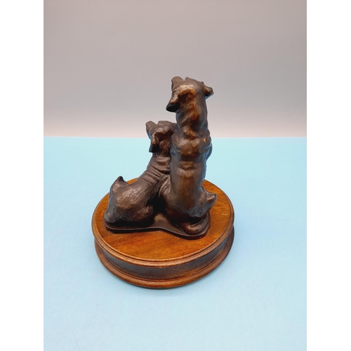 328 - Cold Cast Model of Two Dogs on Plinth. 17cm High, 14cm Diameter.