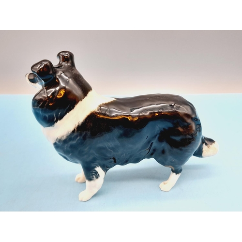 371 - Beswick Figure of a Collie Dog. 14cm High, 18cm Long.