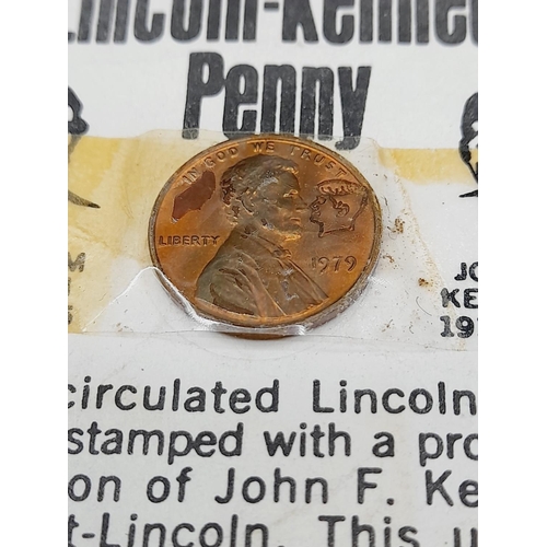 41 - Unusual Uncirculated Lincoln-Kennedy Penny. Stamped with a Profile of Kennedy Looking at Lincoln.