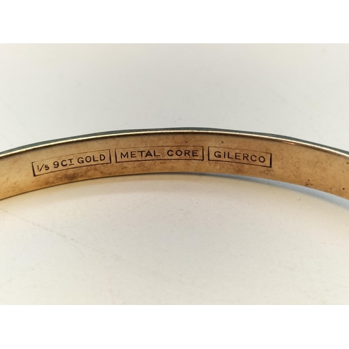 533 - 1/5  9ct Gold Metal Core Bangle.