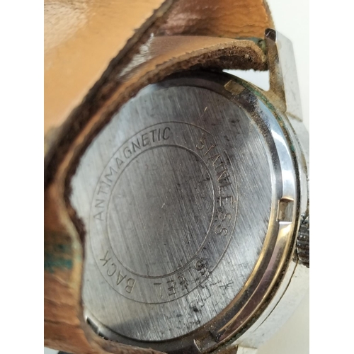 554 - 1960's Mortima Military Style Gents Watch. Scratches to Glass.