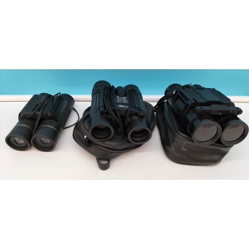 93 - Collection of Binoculars in Twin Handled Basket. 16cm High, 33cm x 22cm.