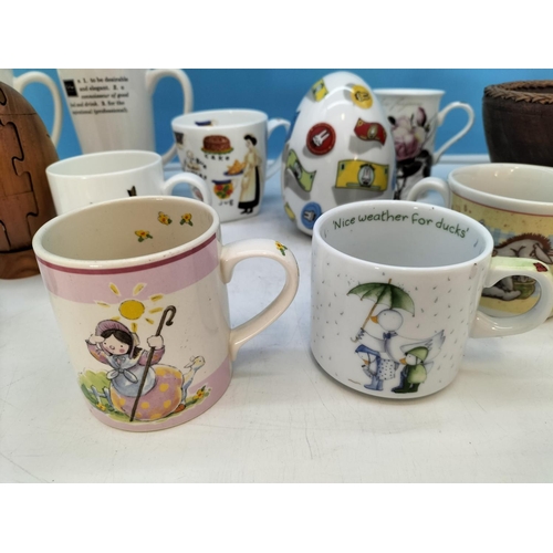 210 - Wooden Puzzle Rugby Ball, Bowl, Money Box plus a Collection of Mugs to include Aynsley, Cadbury, Win... 