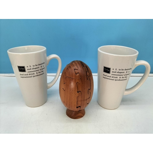 210 - Wooden Puzzle Rugby Ball, Bowl, Money Box plus a Collection of Mugs to include Aynsley, Cadbury, Win... 