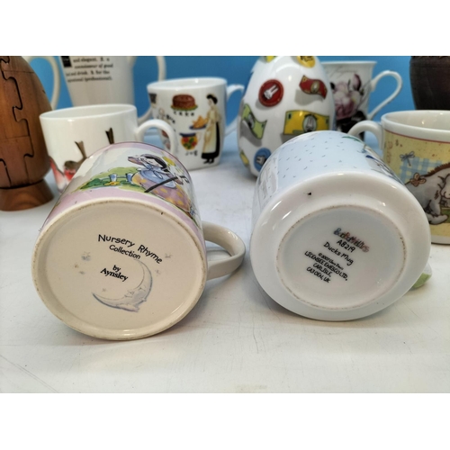 210 - Wooden Puzzle Rugby Ball, Bowl, Money Box plus a Collection of Mugs to include Aynsley, Cadbury, Win... 