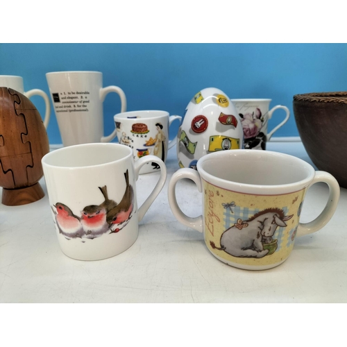 210 - Wooden Puzzle Rugby Ball, Bowl, Money Box plus a Collection of Mugs to include Aynsley, Cadbury, Win... 