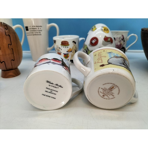 210 - Wooden Puzzle Rugby Ball, Bowl, Money Box plus a Collection of Mugs to include Aynsley, Cadbury, Win... 