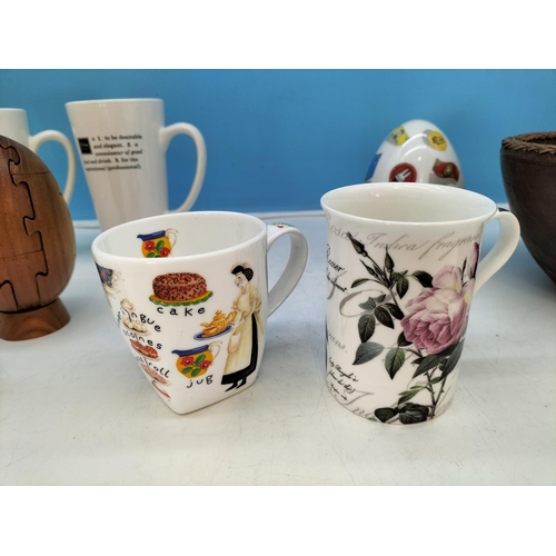 210 - Wooden Puzzle Rugby Ball, Bowl, Money Box plus a Collection of Mugs to include Aynsley, Cadbury, Win... 