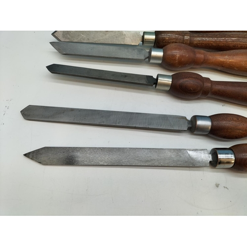 22 - Mahogany Handle 7 Piece Wood Sculpture Set.