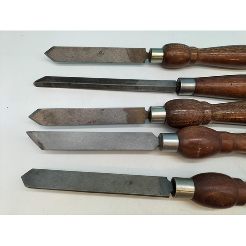 22 - Mahogany Handle 7 Piece Wood Sculpture Set.