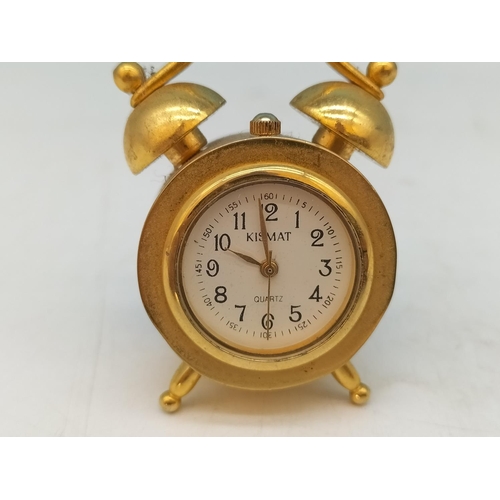 210A - Kismet Mini Alarm Clock plus Metal Golf Ball Bedside Clock 4cm Diameter.