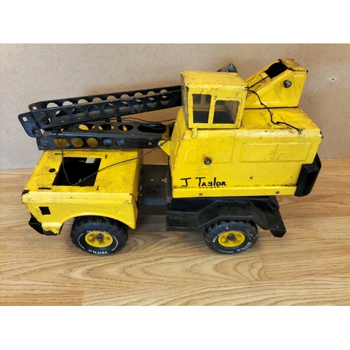 60A - 2 x Play Worn Tonka Toys, T9 Bulldozer and Mighty Crane. Largest 32cm High, 43cm x 21cm.