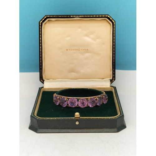 1 - 14ct Gold and Amethyst Bangle. Total Weight 15.5 Grams. With Box.