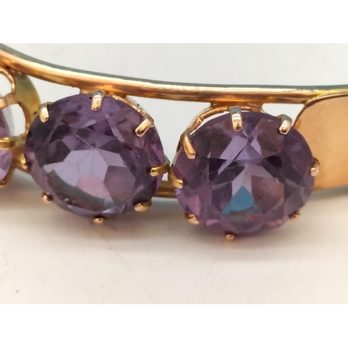 1 - 14ct Gold and Amethyst Bangle. Total Weight 15.5 Grams. With Box.