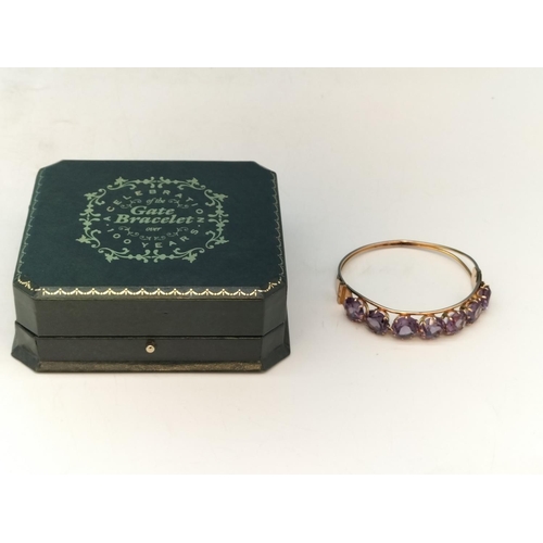 1 - 14ct Gold and Amethyst Bangle. Total Weight 15.5 Grams. With Box.