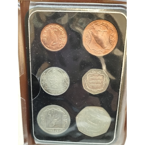 105 - 12 x British First Decimal Coin Sets plus 1 x Isle of Man Coin Sets.
