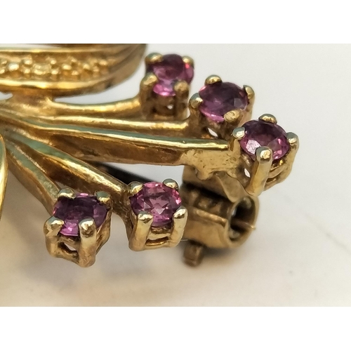 16 - 9ct Gold Hallmarked Flower Brooch with Amethyst Stones. 3.1 Grams.