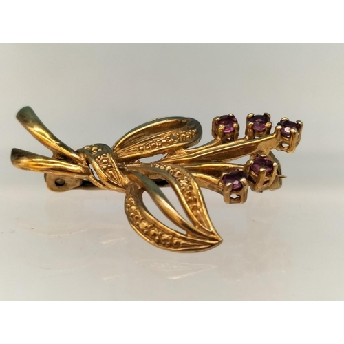 16 - 9ct Gold Hallmarked Flower Brooch with Amethyst Stones. 3.1 Grams.