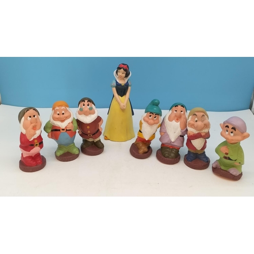 317 - Vintage Disney 20cm Snow White Money Box and Seven Dwarfs Rubber Squeeze Toys.