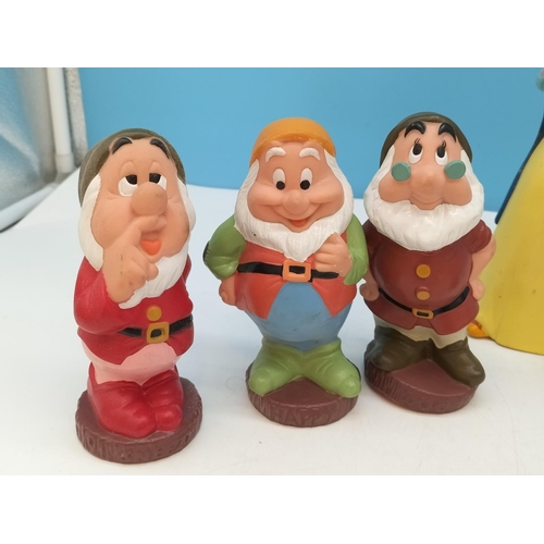 317 - Vintage Disney 20cm Snow White Money Box and Seven Dwarfs Rubber Squeeze Toys.