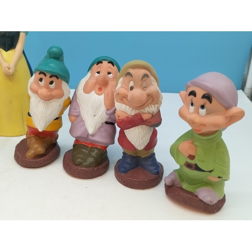 317 - Vintage Disney 20cm Snow White Money Box and Seven Dwarfs Rubber Squeeze Toys.