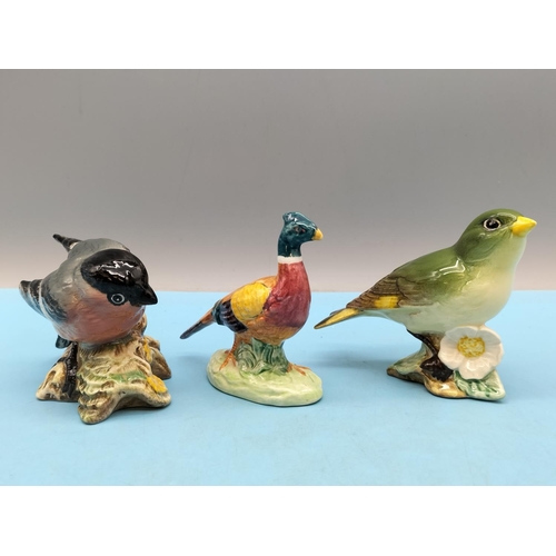 337 - Beswick Bird Figures (3) to include Greenfinch 2105, Bullfinch 1042 and Unmarked Pheasant. Tallest 7... 