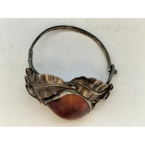 357 - .900 Silver Bangle with Large Natural Amber Centre Stone.