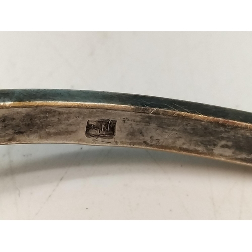 357 - .900 Silver Bangle with Large Natural Amber Centre Stone.