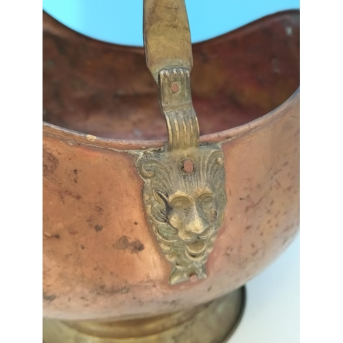 38 - Vintage Copper Helmet Coal Scuttle with Delft Porcelain Handles. 33cm High x 45cm. One Handle A/F.